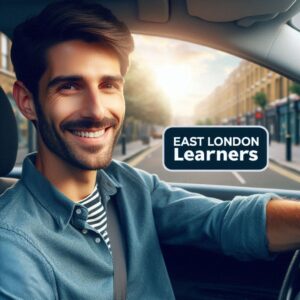 Confident driver smiling in an automatic car on an East London street, representing East London Learners driving school.